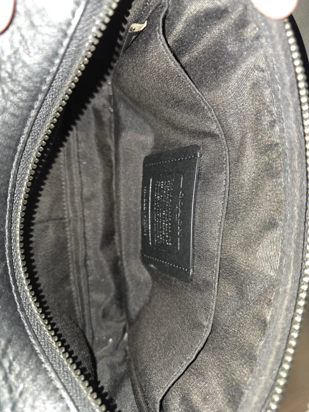 Coach Graham Crossbody bag in Charcoal Black signature coated canvas.